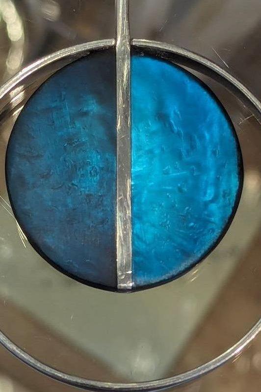 Resin 2 Toned Circle Pendant in Blue and Silver- Merx Jewelry